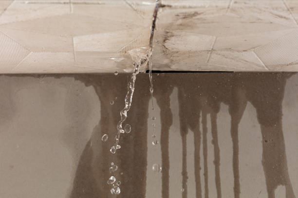 Professional Flood Damage Cleanup technician working in Langley, OK